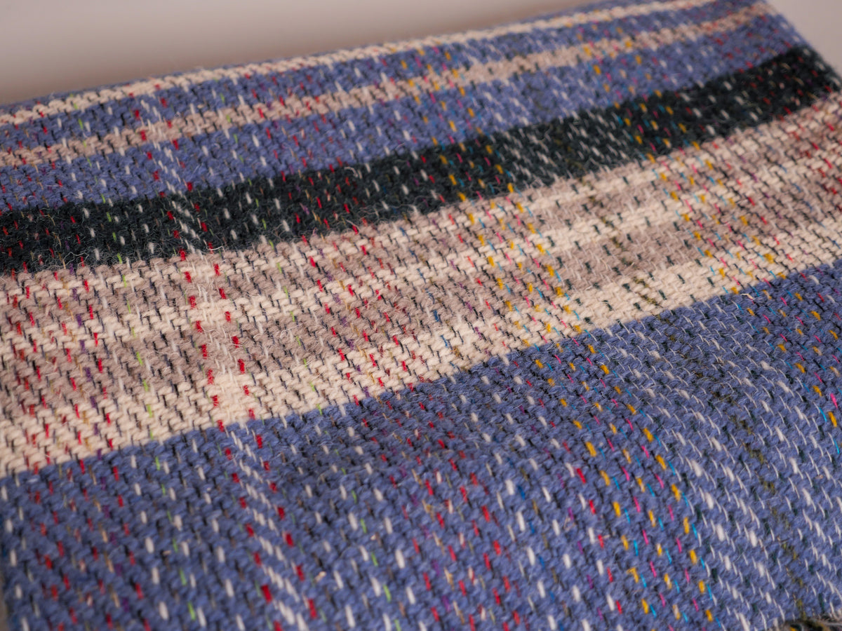 Plaid en laine recylée ; fabrique en Royaume Uni. British Made.