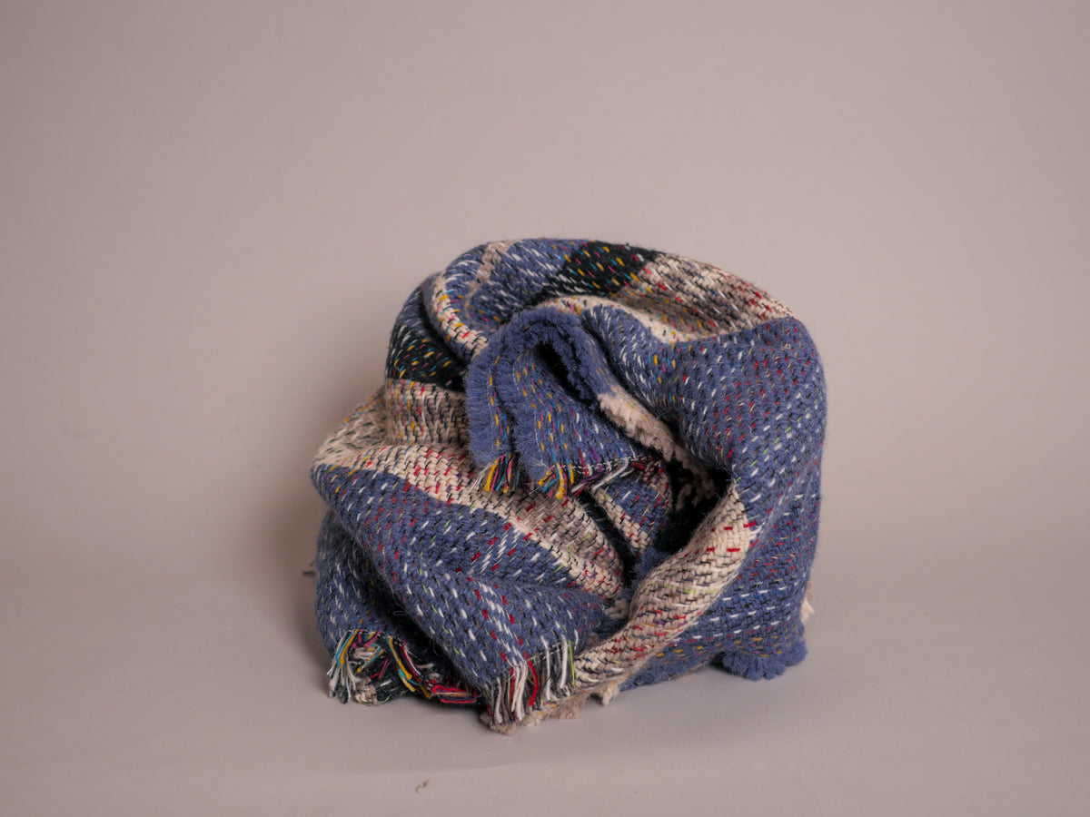 Plaid en laine recylée ; fabrique en Royaume Uni. British Made.