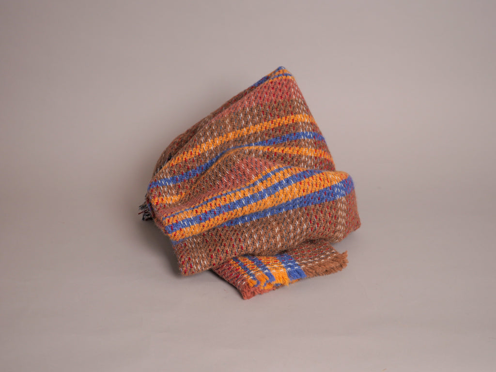 Plaid en laine recylée ; fabrique en Royaume Uni. British Made.
