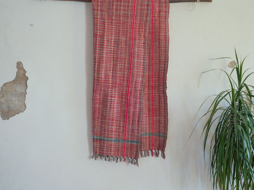Serviette ou plaid en coton tissée à la main, rose. Tissage en fils mélangés.