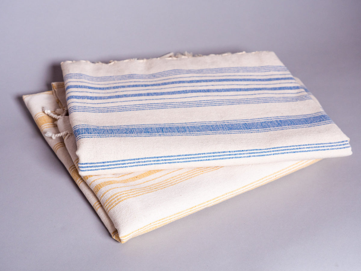 Serviette en coton tissé main jaune pale 