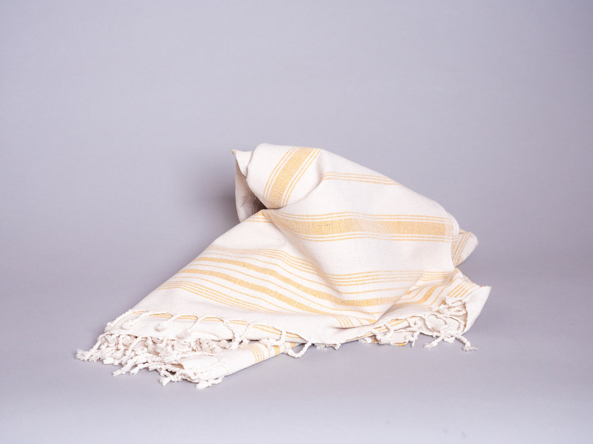 Serviette en coton tissé main jaune pale 