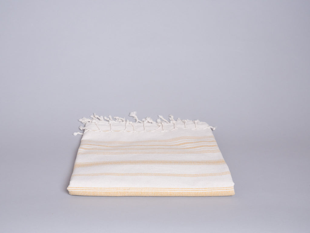 Serviette en coton tissé main jaune pale 