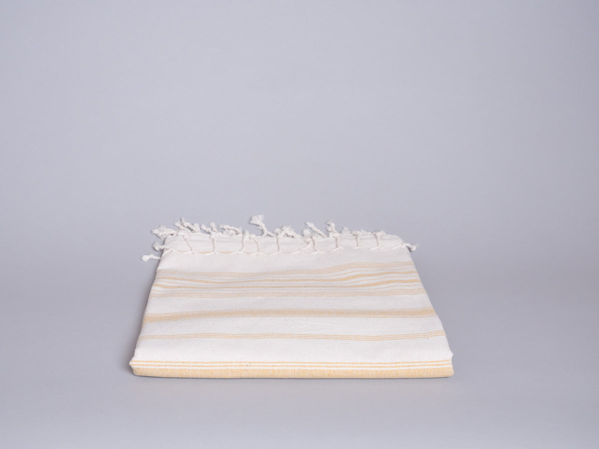 Serviette en coton tissé main jaune pale 