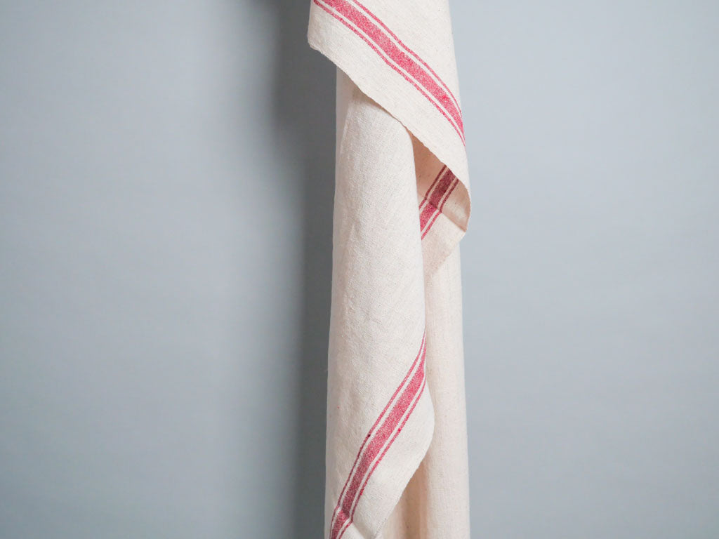 Serviette tissée main : coton écru avec bord rose