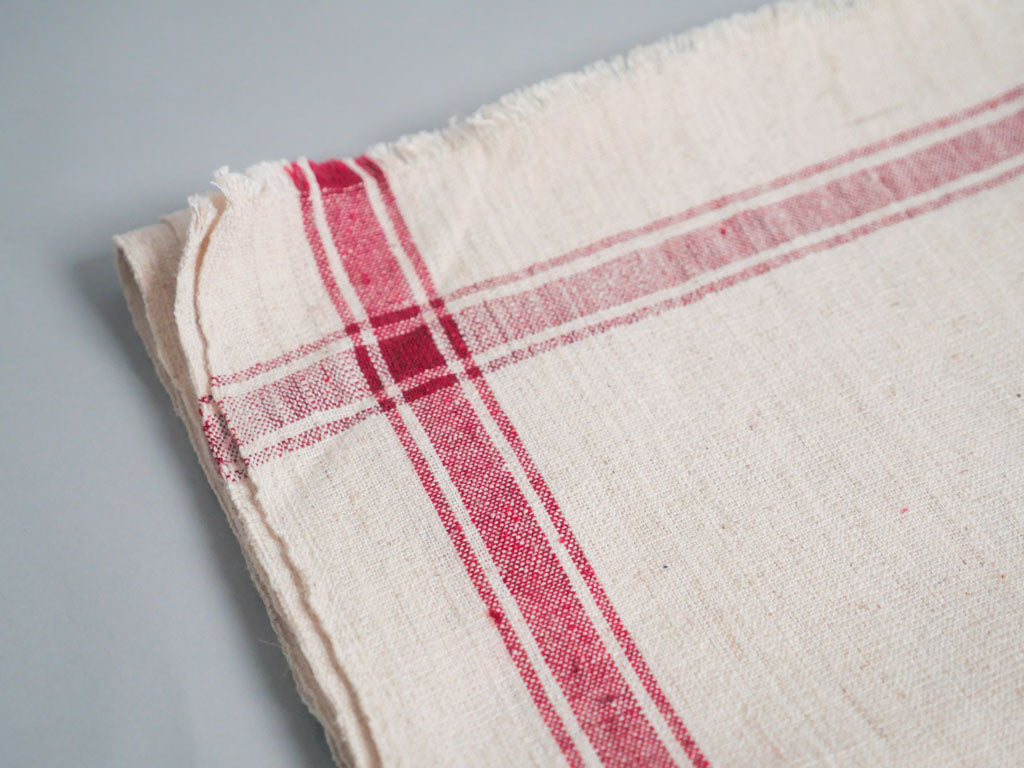 Serviette tissée main : coton écru avec bord rose