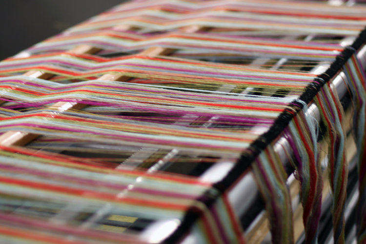 Fabrication de plaids en laine.