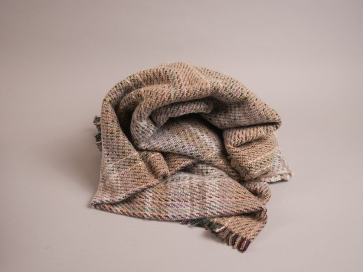 Plaid en laine recyclé.