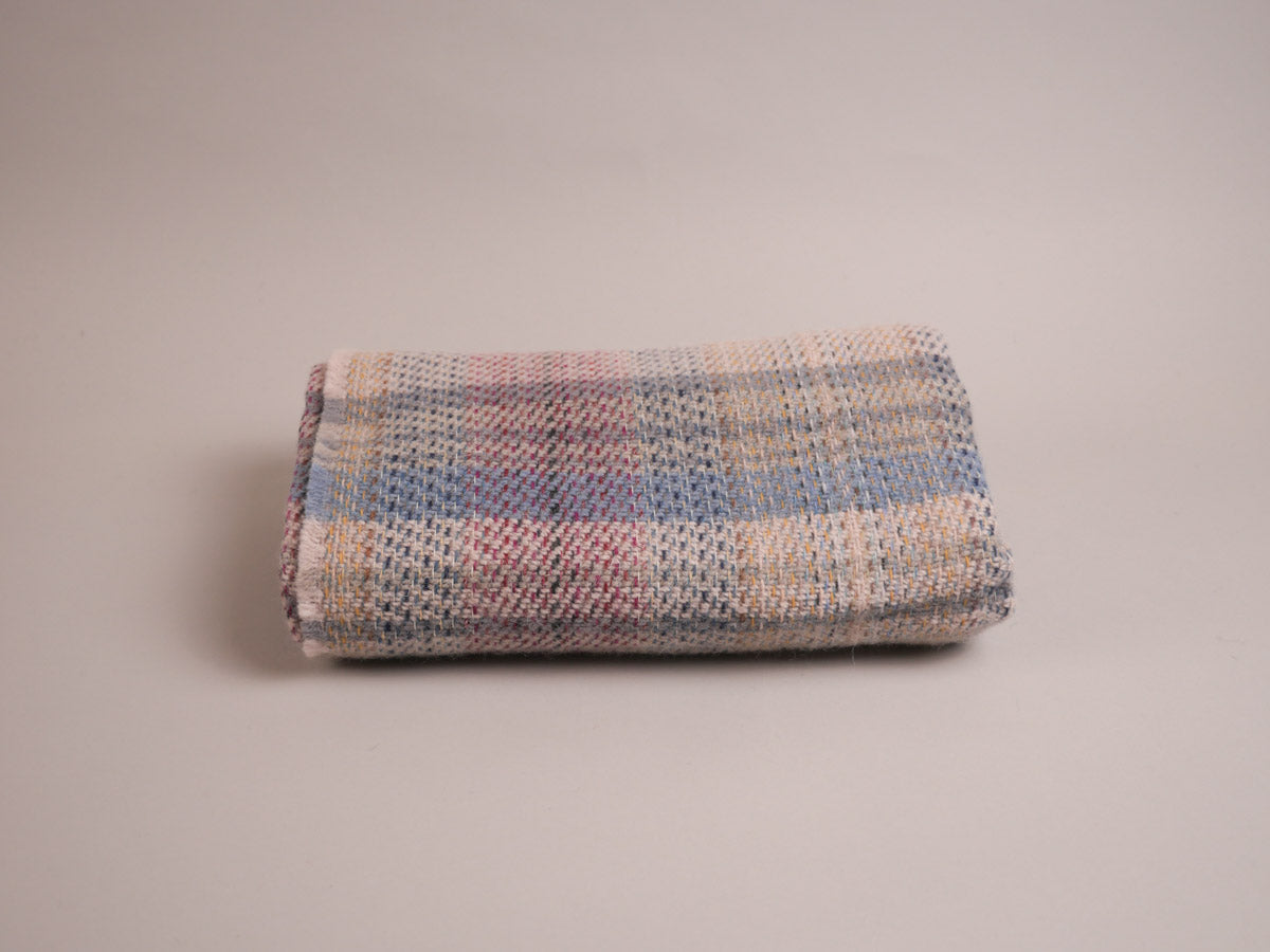 Plaid en laine recyclé.