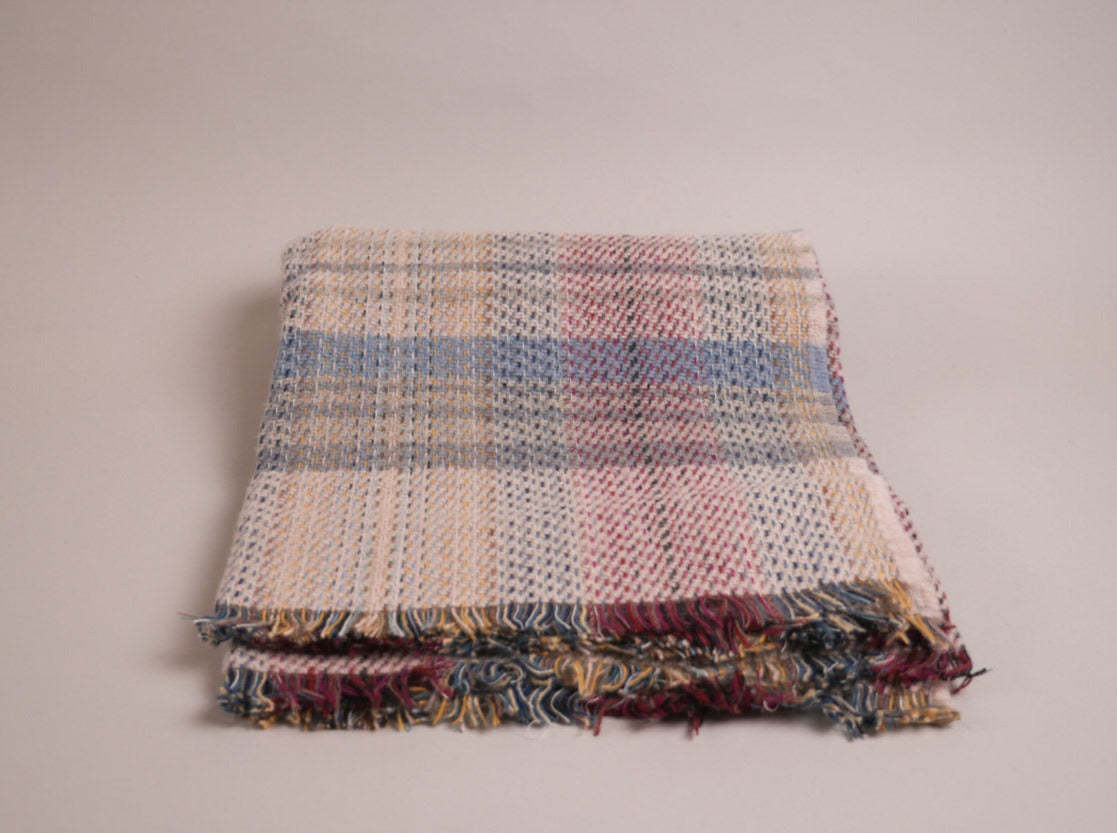 Plaid en laine recyclé.