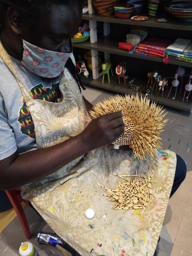 Herrison en racine d'albizia fait main en Afrique de Sud.