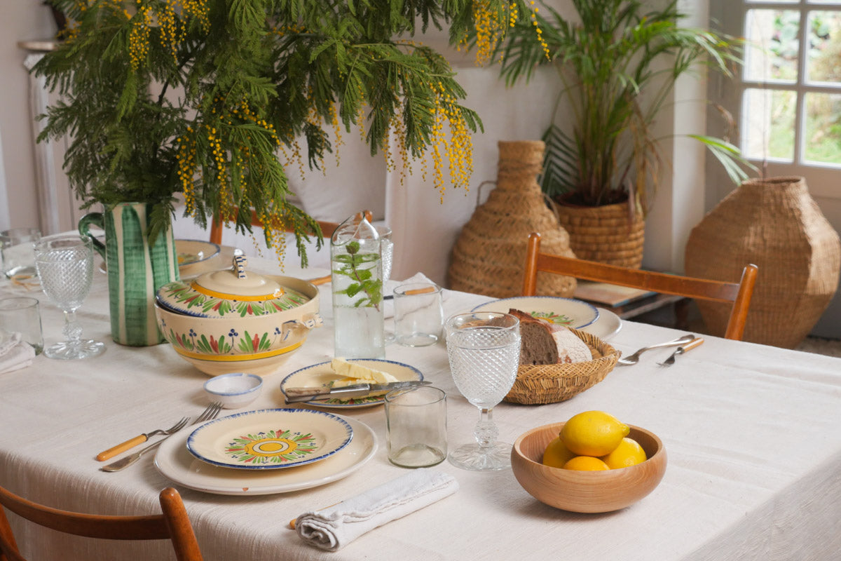 Hand woven table cloth in recycled cotton.